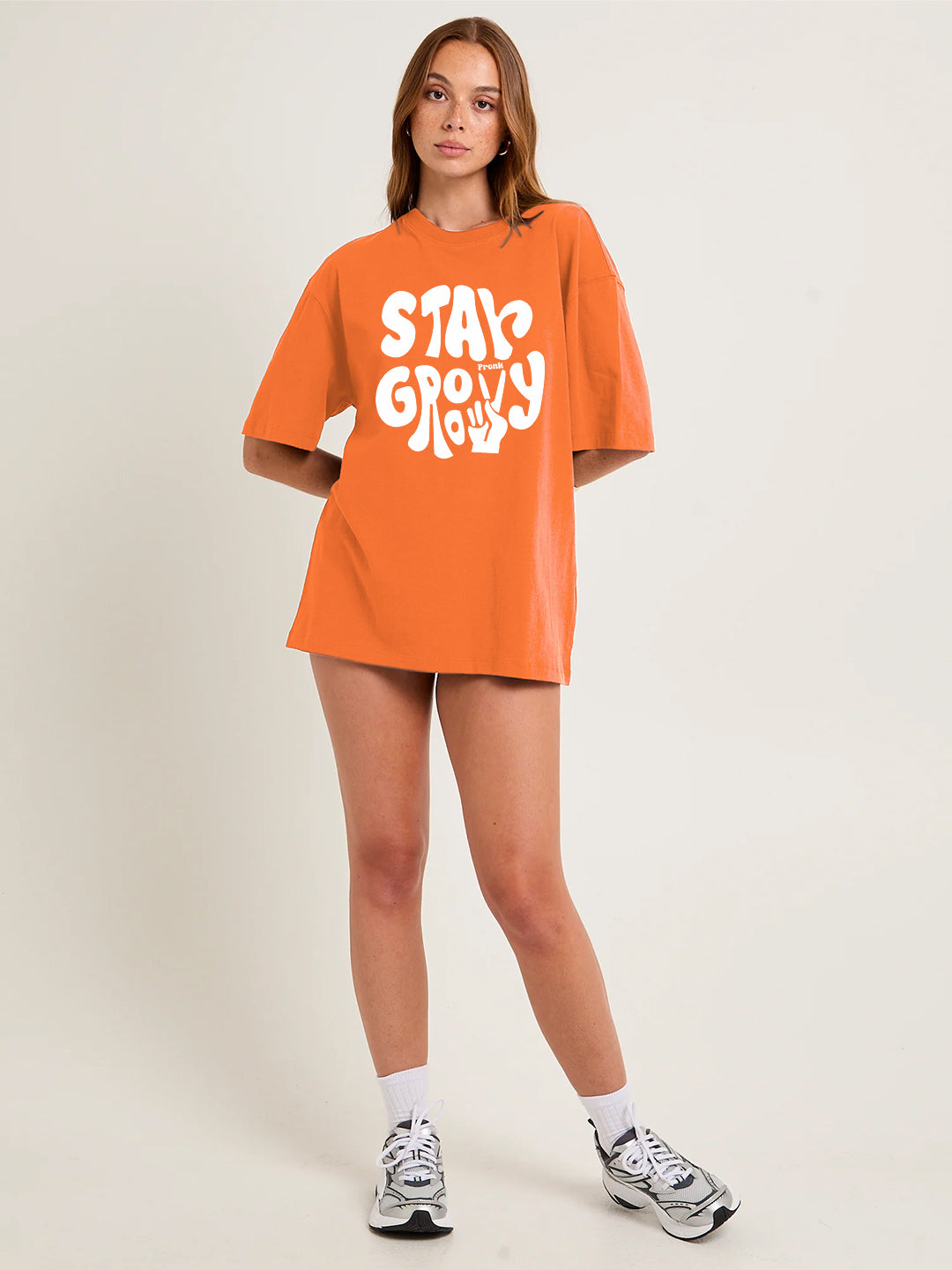 STAY GROOVY Women Graphic Oversized Printed T-Shirt  -  Kurvy Oversized T-Shirt